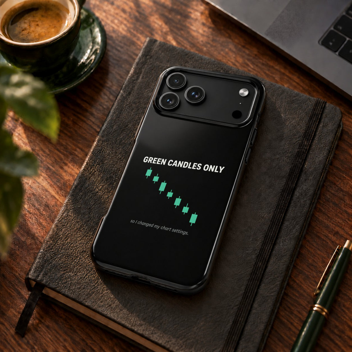 Green Candles Only phone case for iPhone 17 Pro Max, on a desk with coffee and a notebook