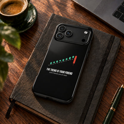 The Trend Is Your Friend phone case for iPhone 17 Pro Max, on a desk with coffee and a notebook
